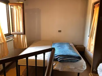 Letto o letti in una camera di Dante 13 Flat