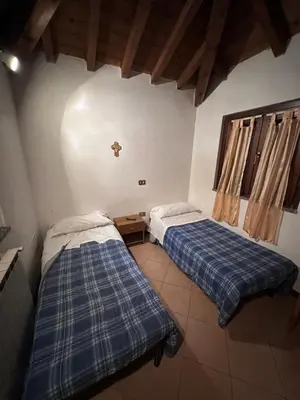 Letto o letti in una camera di Dante 13 Flat