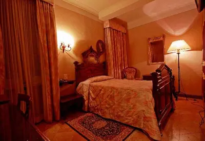 Letto o letti in una camera di Hotel Arnaldo Aquila D’oro