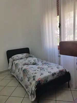 Letto o letti in una camera di Appartamento Golfo dei Poeti