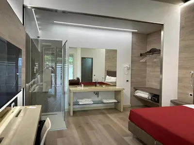 TV o dispositivi per l'intrattenimento presso Luna Residence Hotel