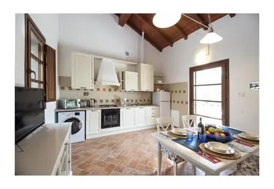 Cucina o angolo cottura di Il Borgo di Tresana Casa Marina