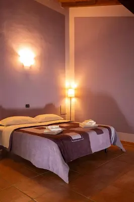 Letto o letti in una camera di Agriturismo di Sordiglio