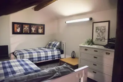 Letto o letti in una camera di B&B MI Casa Tu Casa