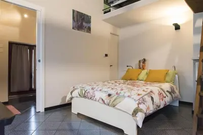 Letto o letti in una camera di B&B MI Casa Tu Casa