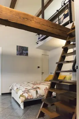 Letto o letti in una camera di B&B MI Casa Tu Casa