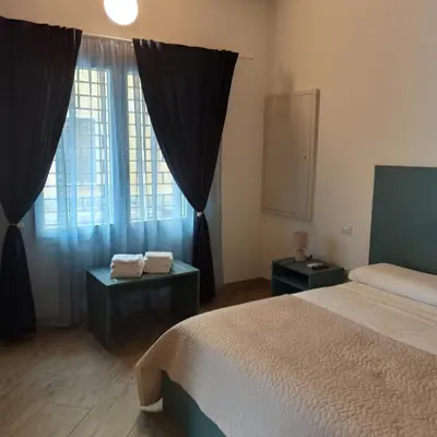 Letto o letti in una camera di I Colli del Garda