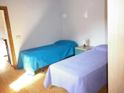 Letto o letti in una camera di La casa del girasole