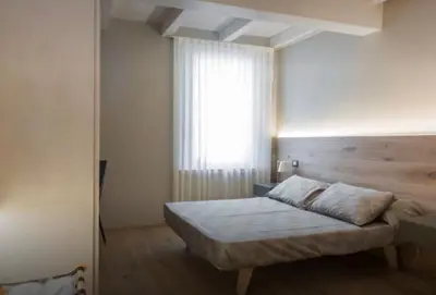 Letto o letti in una camera di Accademia 21