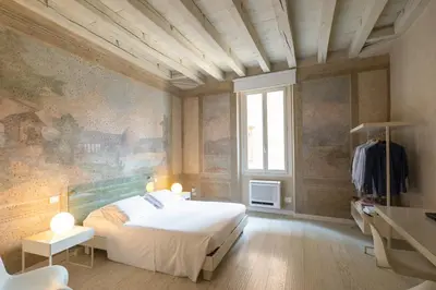 Letto o letti in una camera di Scaravelli Residenza