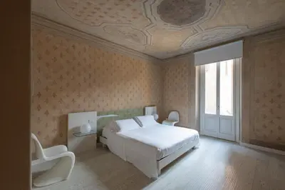 Letto o letti in una camera di Scaravelli Residenza
