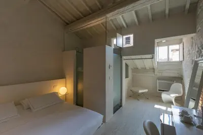 Letto o letti in una camera di Scaravelli Residenza