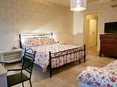 Letto o letti in una camera di Foresteria Borgo Delle Grazie