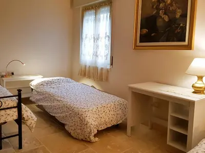 Letto o letti in una camera di Foresteria Borgo Delle Grazie