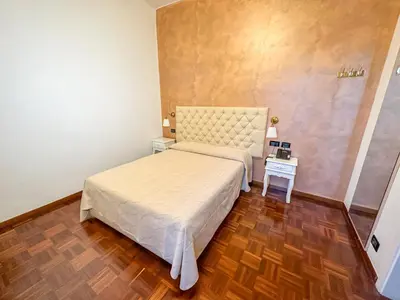 Letto o letti in una camera di Hotel Dell'Orto