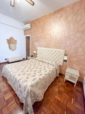Letto o letti in una camera di Hotel Dell'Orto