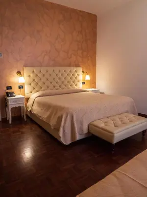 Letto o letti in una camera di Hotel Dell'Orto