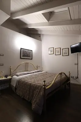 Letto o letti in una camera di R&B Il Melograno