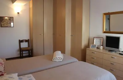 Letto o letti in una camera di B. & B. NABUCCO
