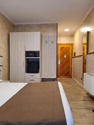 Letto o letti in una camera di Hotel Lenotel