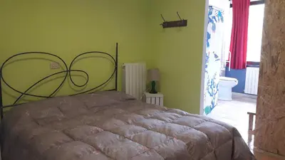 Letto o letti in una camera di Ostello Valtrebbia