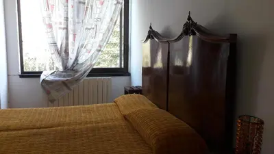 Letto o letti in una camera di Ostello Valtrebbia