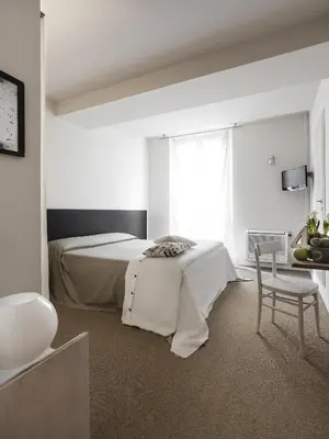 Letto o letti in una camera di Hotel Cervetta 5