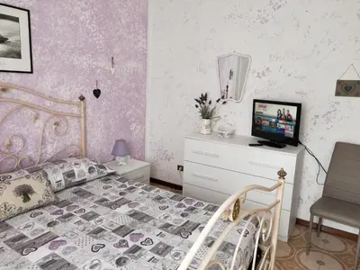 Letto o letti in una camera di Yellow Submarine Freeparking petfriendly