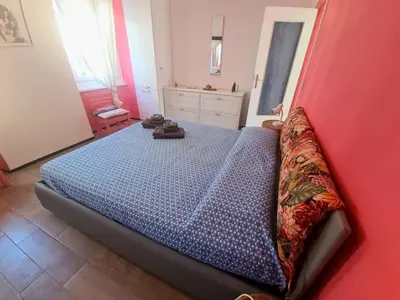 Letto o letti in una camera di Rosa Tramonto Portofino by PortofinoVacanze