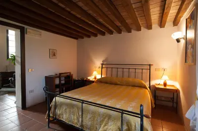 Letto o letti in una camera di Relais Fontevivo