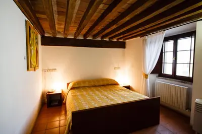 Letto o letti in una camera di Relais Fontevivo