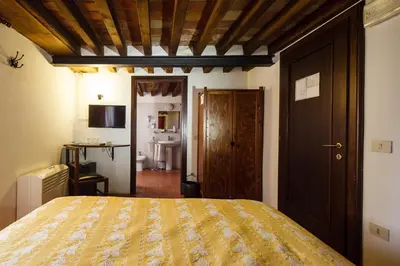 Letto o letti in una camera di Relais Fontevivo