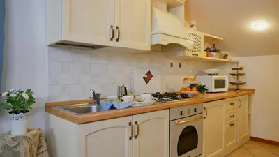 Cucina o angolo cottura di La Meridiana Affittacamere