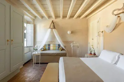 Letto o letti in una camera di Palazzo Novello