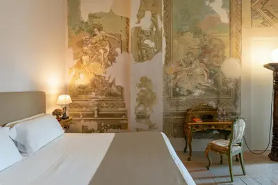 Letto o letti in una camera di Palazzo Novello