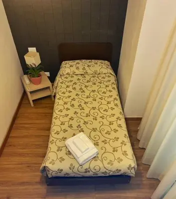 Letto o letti in una camera di Locanda L'Ombrosa