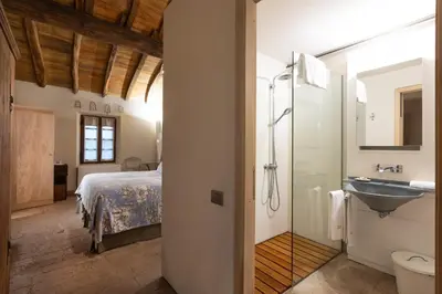 Letto o letti in una camera di Antica Corte Pallavicina Relais