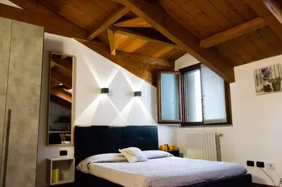Letto o letti in una camera di Monolocale vicino Milano CIR 00014