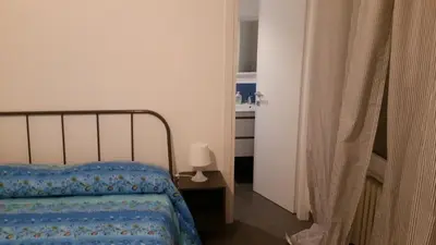 Letto o letti in una camera di Sunny Home