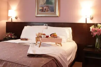Letto o letti in una camera di Hotel City