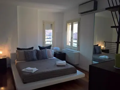Letto o letti in una camera di Modena Charme
