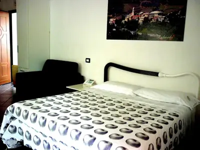 Letto o letti in una camera di Costa Morroni