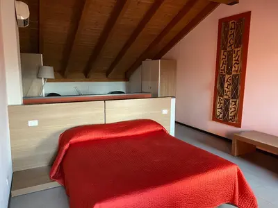 Letto o letti in una camera di Residence Le Volte Apartments