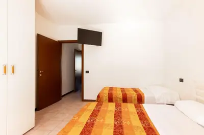 Letto o letti in una camera di Maranello Suite
