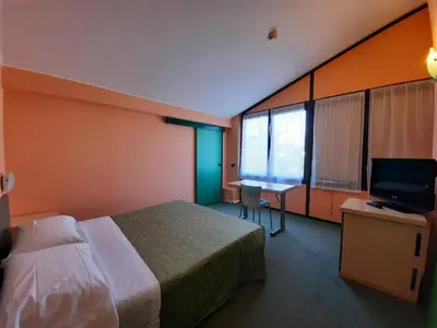 Letto o letti in una camera di Ducathotel