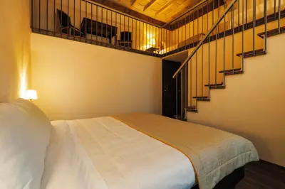 Letto o letti in una camera di Castello Di Compiano Hotel Relais Museum