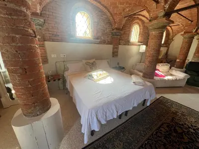 Letto o letti in una camera di B&B Antica cascina
