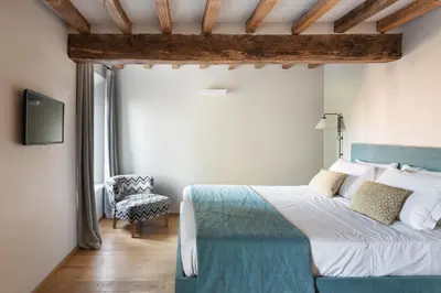 Letto o letti in una camera di Relais Roncolo 1888 - Small Luxury Hotels of the World