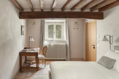 Letto o letti in una camera di Relais Roncolo 1888 - Small Luxury Hotels of the World