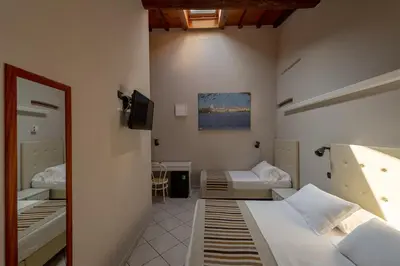 Letto o letti in una camera di Antico Residence, MantegnaHotels